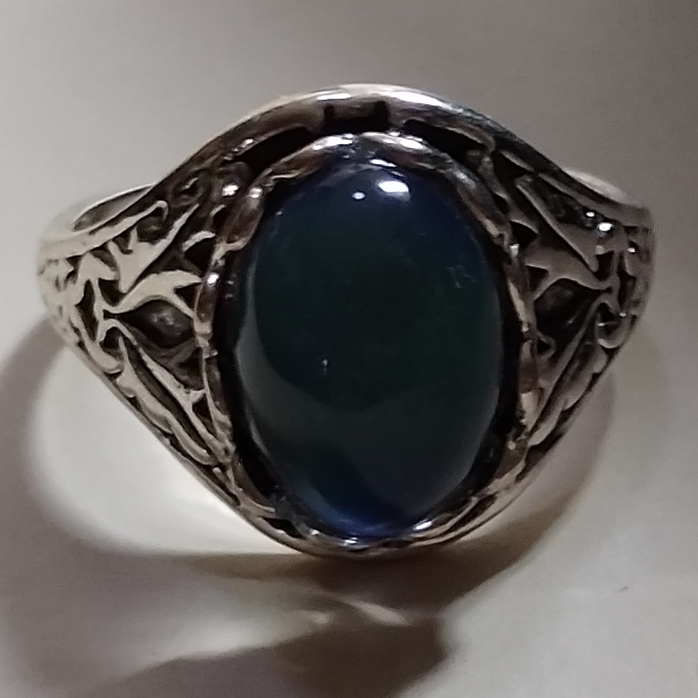 Ornate Silver Filigree Ring with Deep Blue Oval Stone